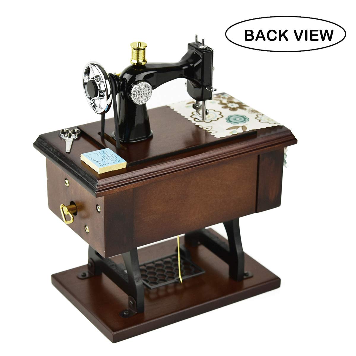 Mr.Winder spool mouse figure adds whimsical detail