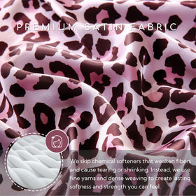 MR&HM satin flat sheet and pillowcases in pink leopard on a made bed