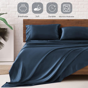 MR&HM mood indigo satin sheets styled on a bed for elegance.