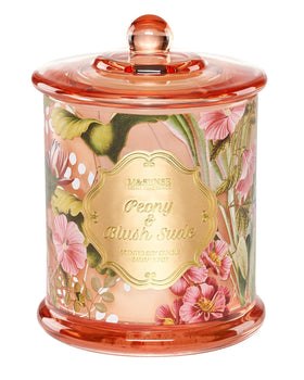 M&SENSE Peony Blush Sude Candle jar in crystal glass enhances elegant room ambiance.