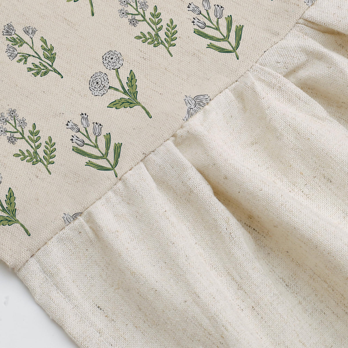 MUGINYU 200gsm polyester fabric with linen-like feel for soft, premium drape.