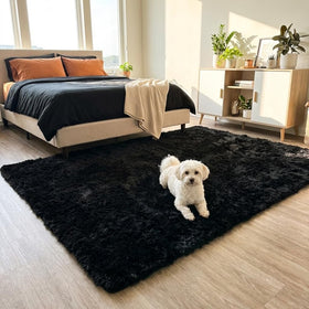 Mugorn black rug ideal for bedroom or dorm decor and lounging.
