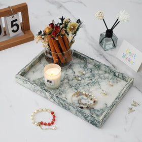 MULWR Marble Tray bathroom decor displaying soaps and cosmetics on a tidy surface.
