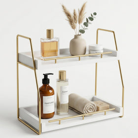 Mustry bathroom countertop organizer with gold frame showcases essentials neatly and saves counter space.