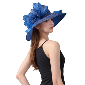 Muswarm organza hat features floral embellishment for subtle glamour in formal looks.