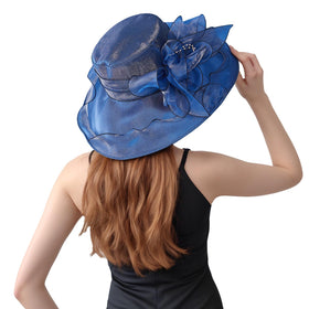 Muswarm navy sun hat crafted from breathable organza for all-day outdoor wear.