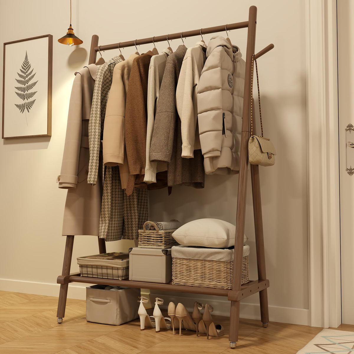 Muwuele solid wood clothing rack in walnut, full setup for organized garments.