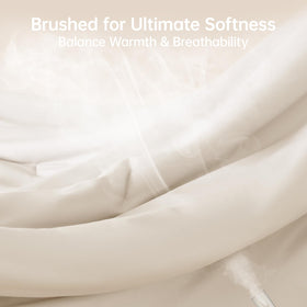 MUXHOMO beige full comforter close-up fabric reveals microfiber softness.
