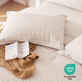 Muxhomo beige queen size bedding on bed