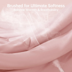 MUXHOMO Pillow Shams rose gold close-up with matching comforter for coordinated look.