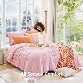 MUXHOMO Pink Queen Comforter Set spot quilting detail keeps fill evenly distributed.
