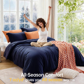 MUXHOMO quilted pillow shams complete the queen set for coordinated bedding.
