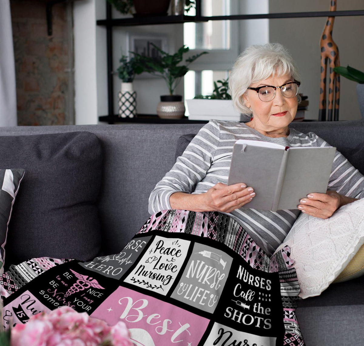 Gift-opening moment reveals thoughtful nurse appreciation blanket