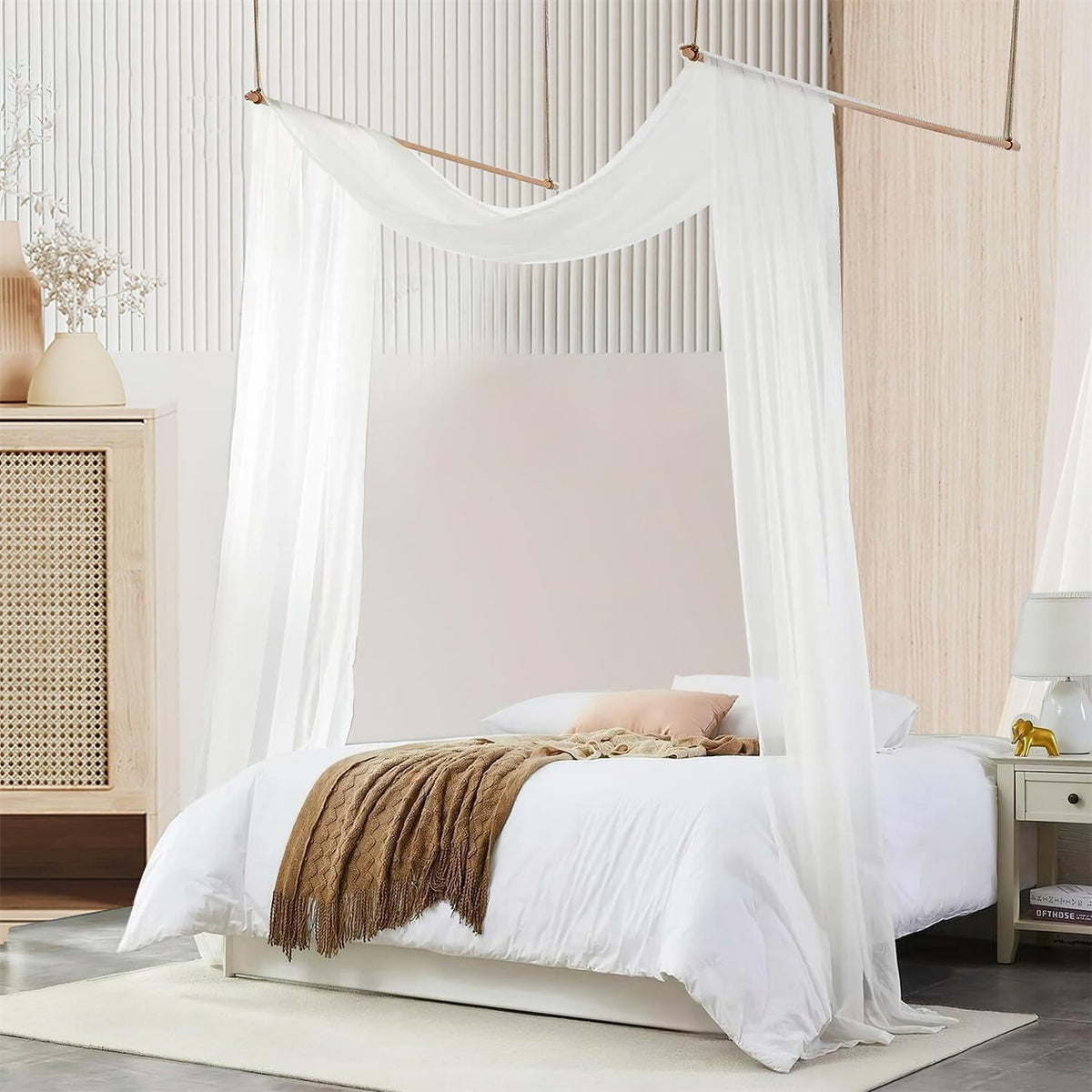 MVOVM queen/full bed canopy in white tulle elevates decor.