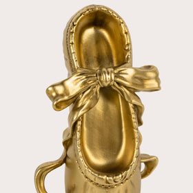 MXARLTR decorative dance-inspired bookends add a graceful touch to any desk.
