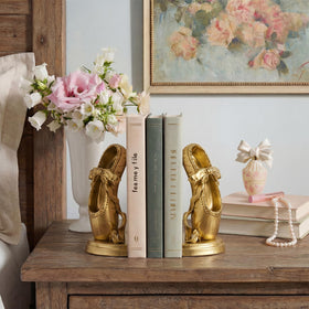 MXARLTR heavy-duty bookends with a gold finish keep books upright and secure.
