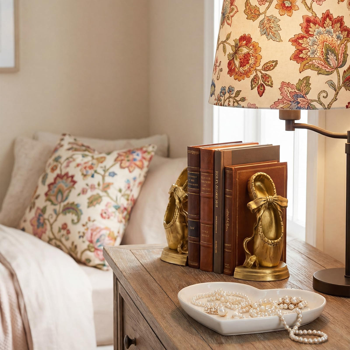 MXARLTR vintage-style gold bookends enhance shelves with timeless charm.