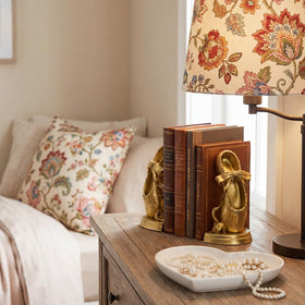 MXARLTR vintage-style gold bookends enhance shelves with timeless charm.