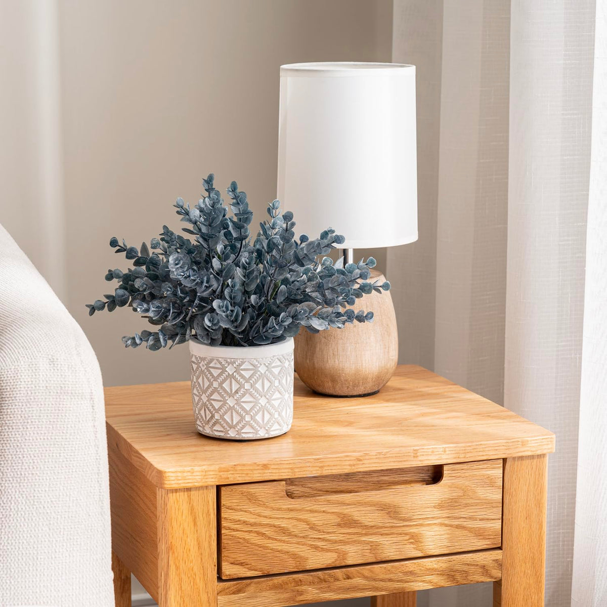 MyGift artificial eucalyptus with a durable concrete pot withstands busy environments