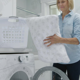 MyPillow night-time comfort scene emphasizes plush feel and relaxed support