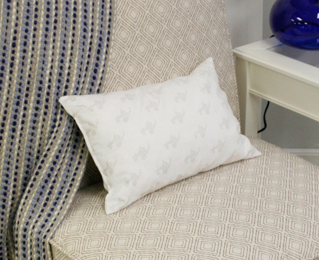 MyPillow Go Anywhere between knees for pelvic comfort during rest