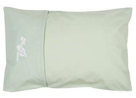 MyPillow multi-use travel pillow rolled in its built-in case for easy portability.