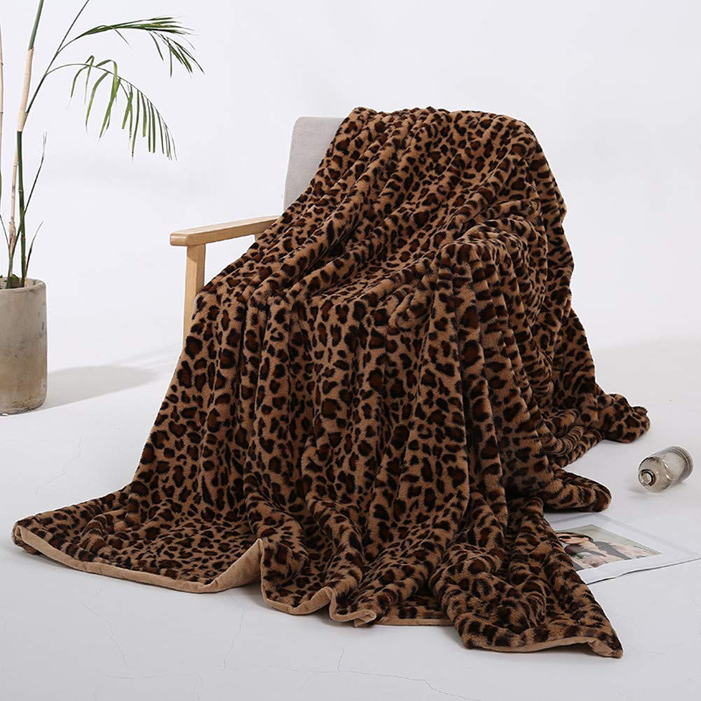MYRU Velboa leopard blanket closeup shows plush fur texture and softness.