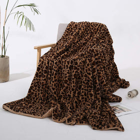 MYRU Velboa leopard blanket closeup shows plush fur texture and softness.