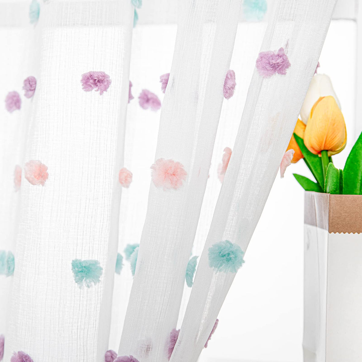 MYSKY HOME Rainbow Pom Pom Curtains show silky texture in a bright living room.