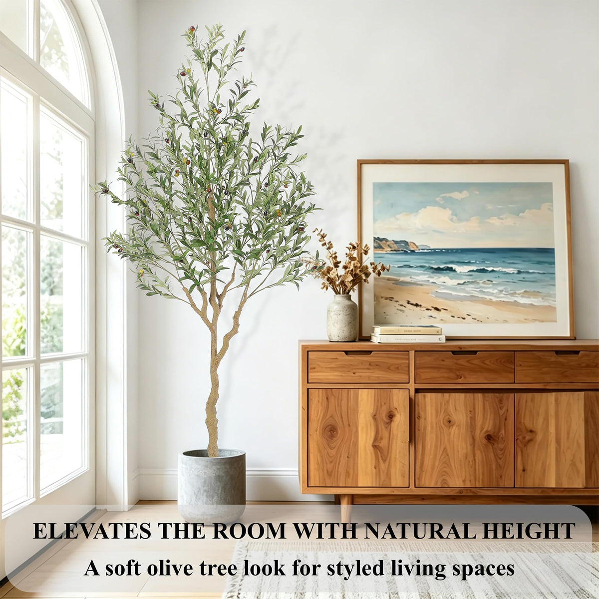 Nafresh tall olive tree stairs foyer decor invites calm atmosphere.