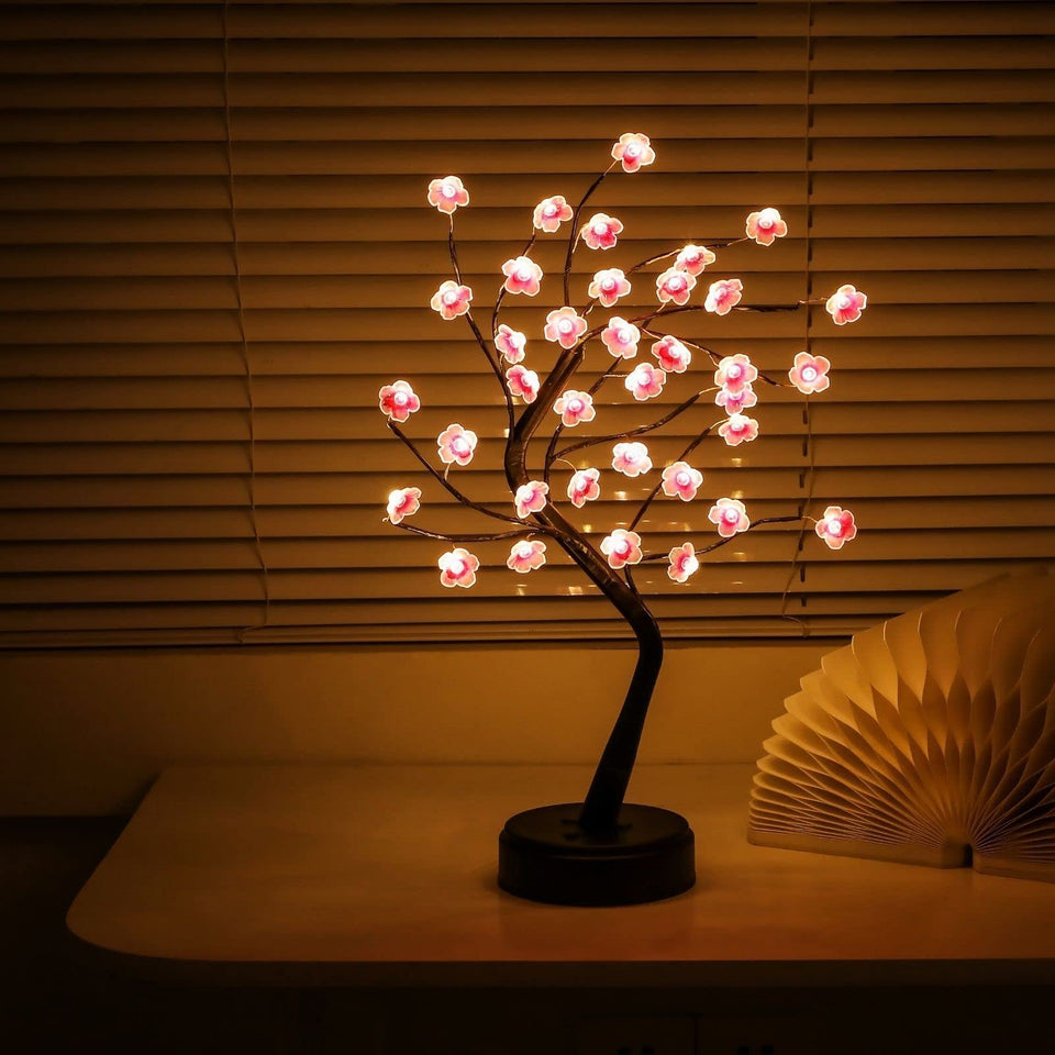 Nakolulu Cherry Blossom Tree Lamp 18in emits graceful ambient light for cozy spaces.