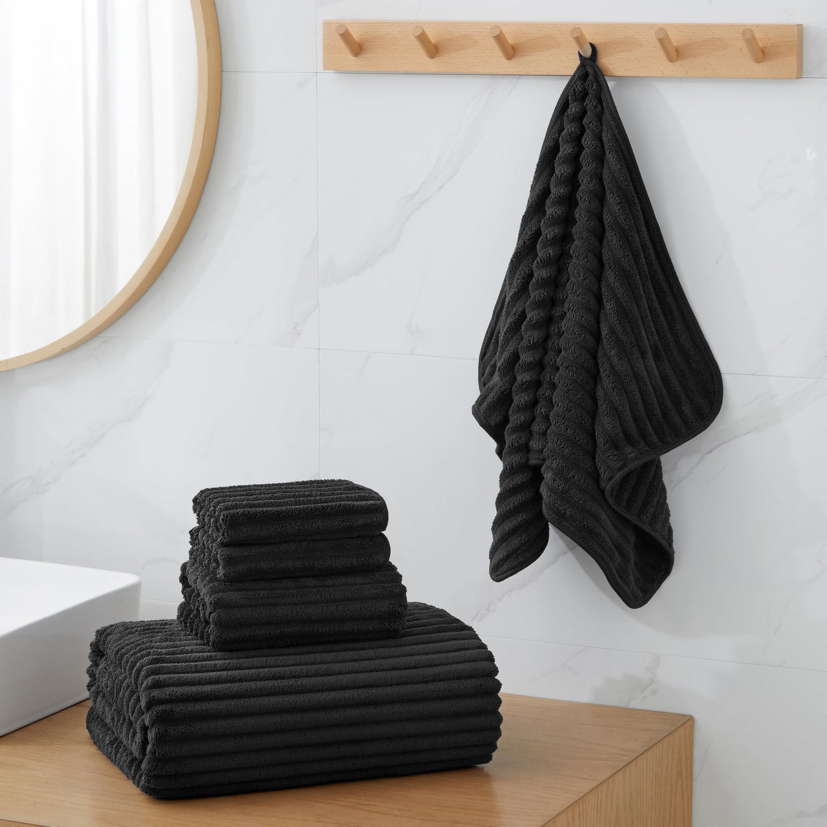 NALIVO extra-large bath towel set 40x80 folded pack for storage and display.