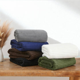 NALIVO home spa setup with charcoal-gray towels in a contemporary bathroom