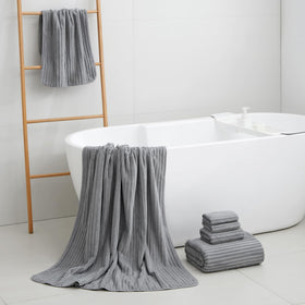 NALIVO towels include hanging loops for easy storage after showers.