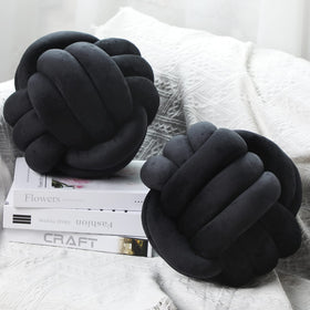 Namalu soft knot pillow ball black 20cm front view adds cozy flair to living space.