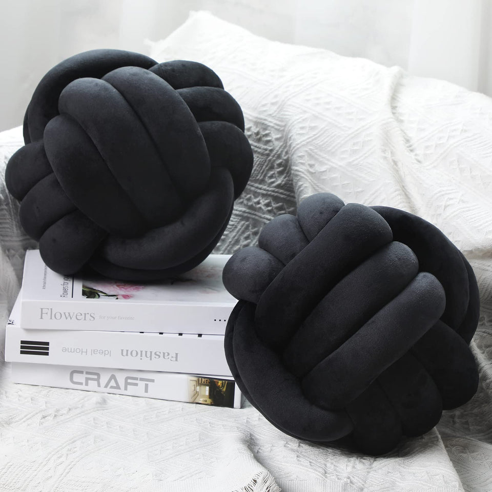 Namalu soft knot pillow ball black 20cm front view adds cozy flair to living space.