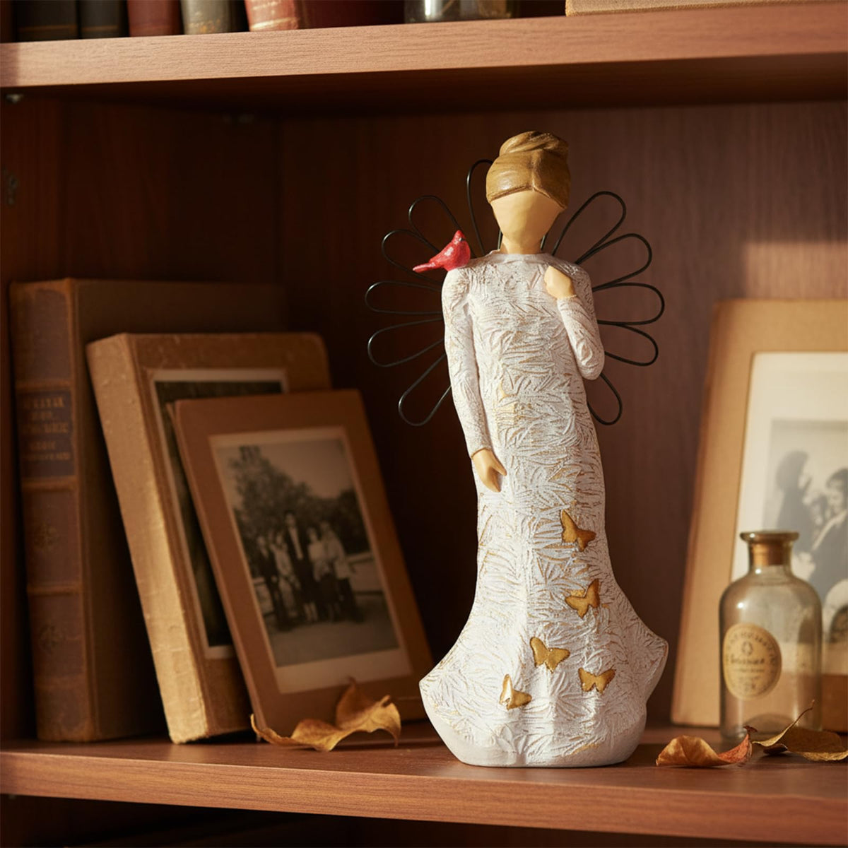 NAN ZAI NAN FANG Golden butterfly detail enhances the angel's charm