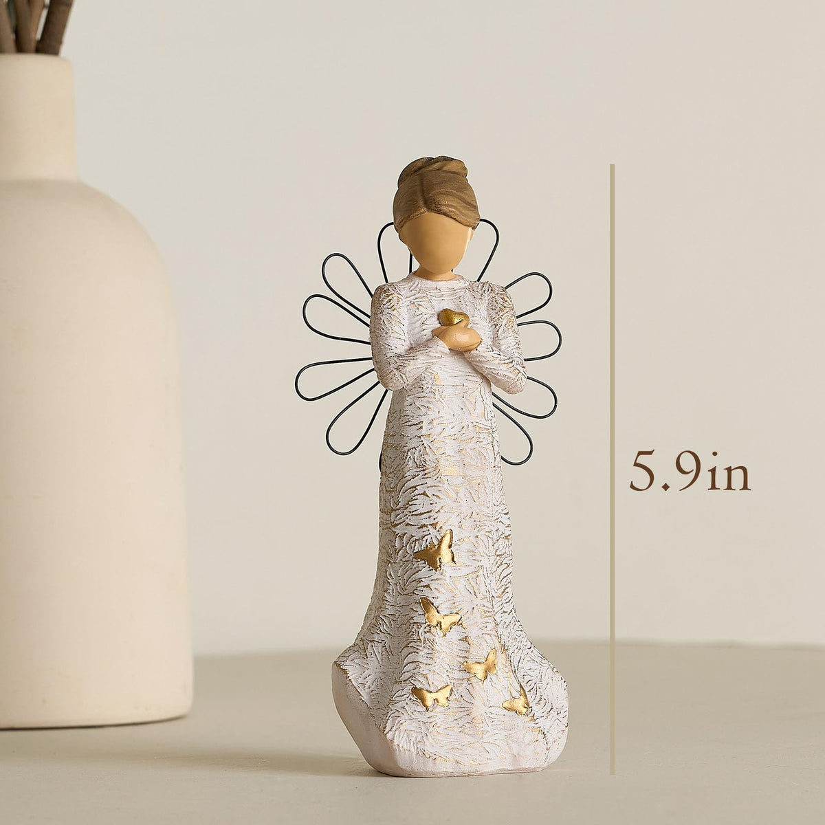 NAN ZAI NAN FANG cream dress angel statue with timeless devotional charm.