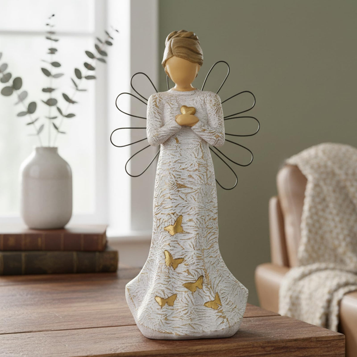 NAN ZAI NAN FANG gold butterfly skirt detail adds subtle elegance.