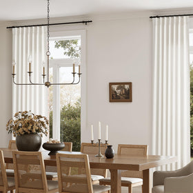 Nanspring back-tab hanging option shows hidden rod for a sleek ceiling-to-floor look.