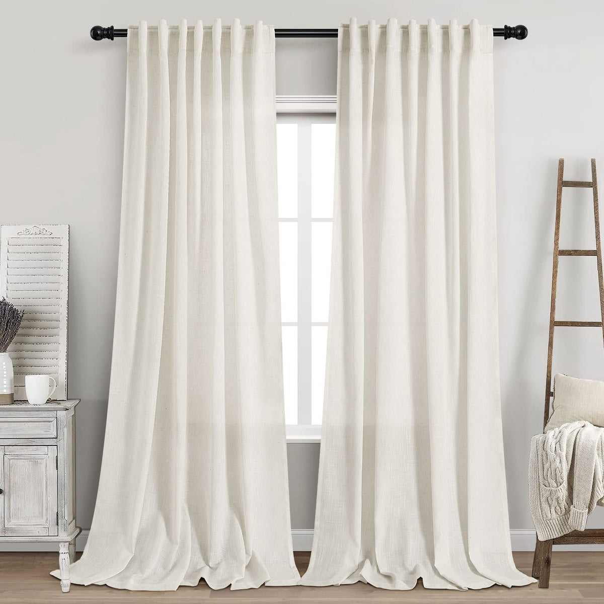 Nanspring extra long curtains with back tab in cream create elegant pleats and soft light.