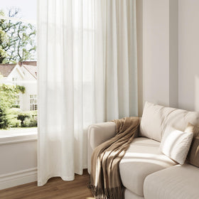 Nanspring linen curtains suit modern farmhouse dining with warm ambiance.