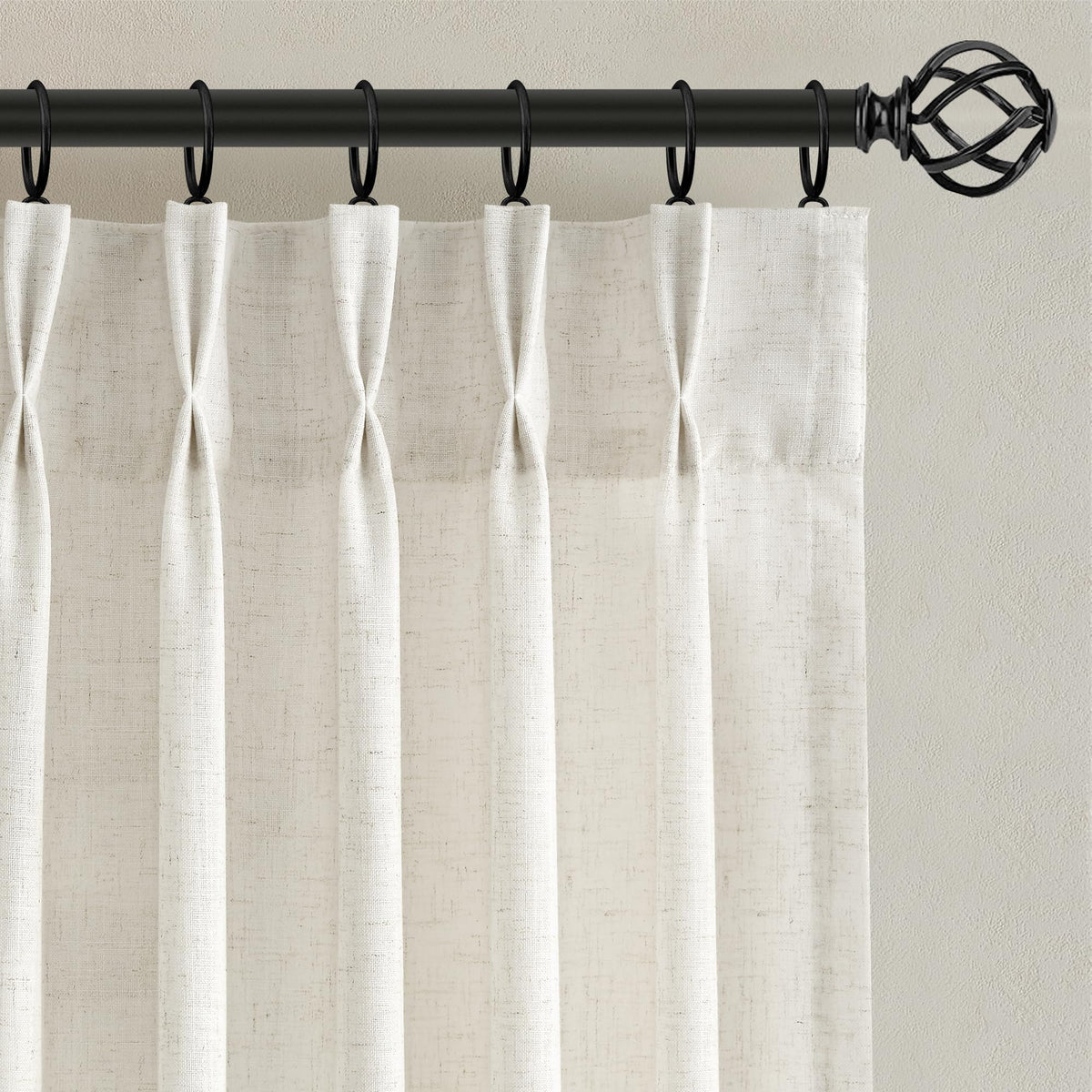 Nanspring linen pinch-pleated front-view panel diffuses light softly for inviting rooms.