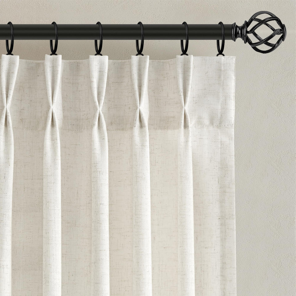 Nanspring linen pinch-pleated front-view panel diffuses light softly for inviting rooms.