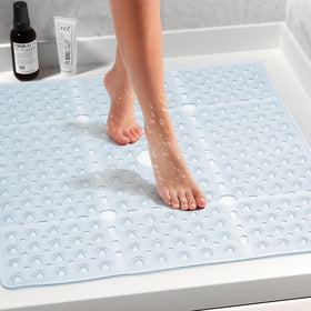 Naoloture shower mat showing drain holes for quick water drainage