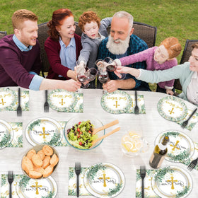 Naozinebi table decor with eucalyptus and cross close-up for a fresh religious ambiance.