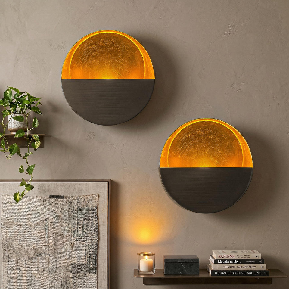 NativeSkins Eclipse wall sconce with gold interior creates warm, intimate candlelight.