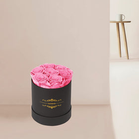 NATROSES packaging with pink hue, a premium keepsake for celebrations.