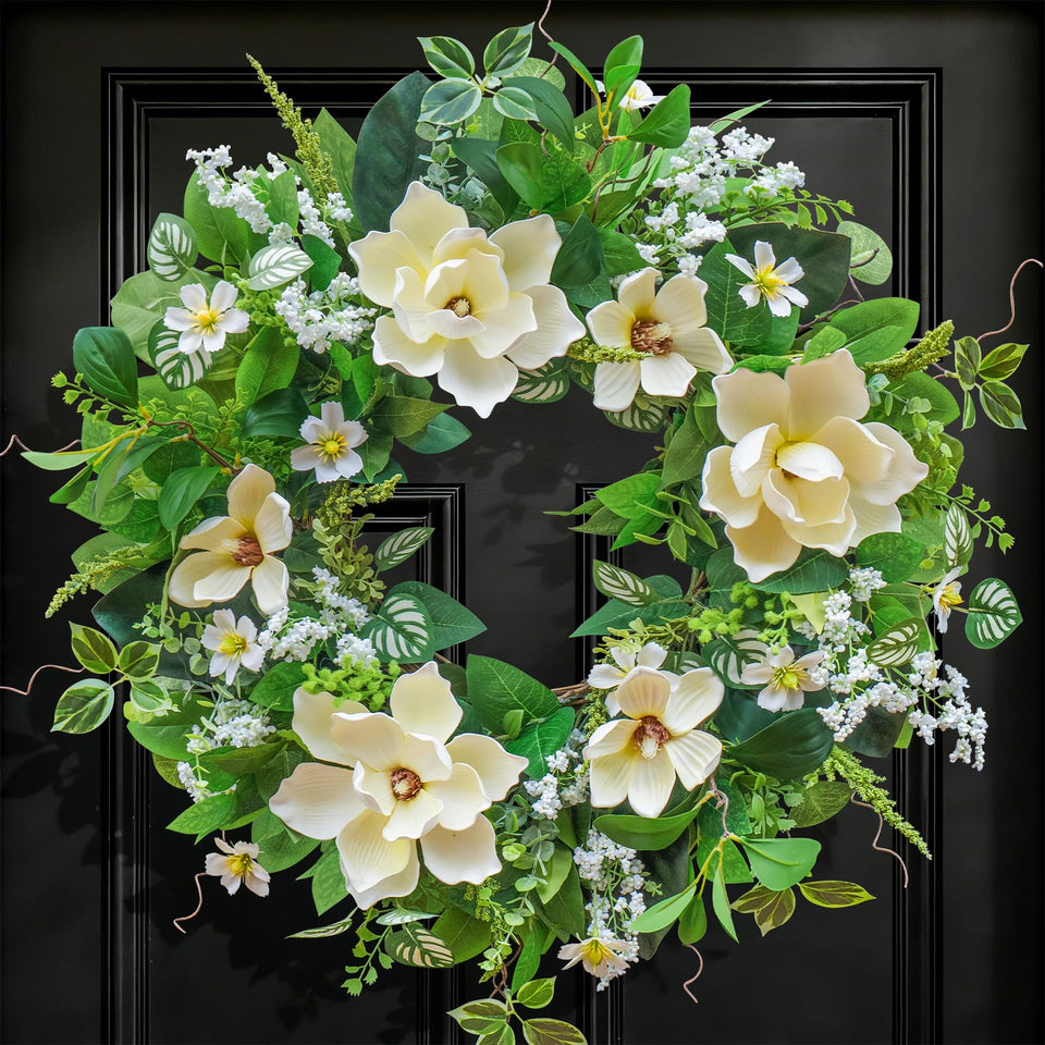 NaturaWre 24 Inch Magnolia Wreath with white blooms for a welcoming front door.