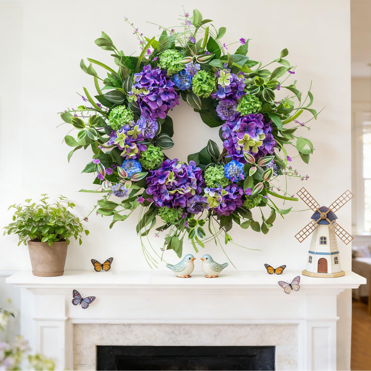 NaturaWre hydrangea and thistle clusters create seasonal color accents.